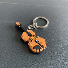 Load image into Gallery viewer, Musical Instrument Guitar Pvc Soft Keychain Piano Clarinet Saxophone Zhongruan Ukulele Electric guitar Violin Color Guzheng Lute African drum
